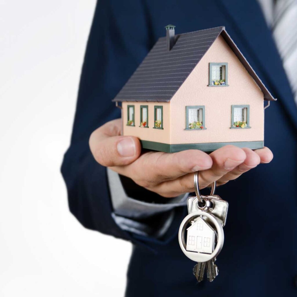 Podpisywanie umowy podziału gruntu Współwłaściciele składający podpisy pod umową w kancelarii notarialnej